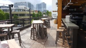 Buzon Pedestals and Ipe Hardwood Pavers on Rooftop Deck at 10 Barrel Brewing