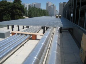 Industrial Grating Over Buzon Pedestals to Create Walkable Platform Over HVAC Ducts