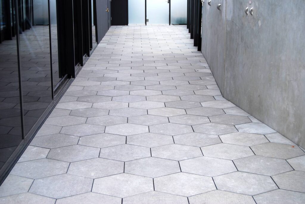 Polygonal Shaped Stone Over Buzon BC Series Pedestals in Walkway Application