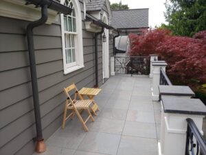 Porcelain Paver Balcony Makeover Uses Buzon Low-Profile Pedestal Solution