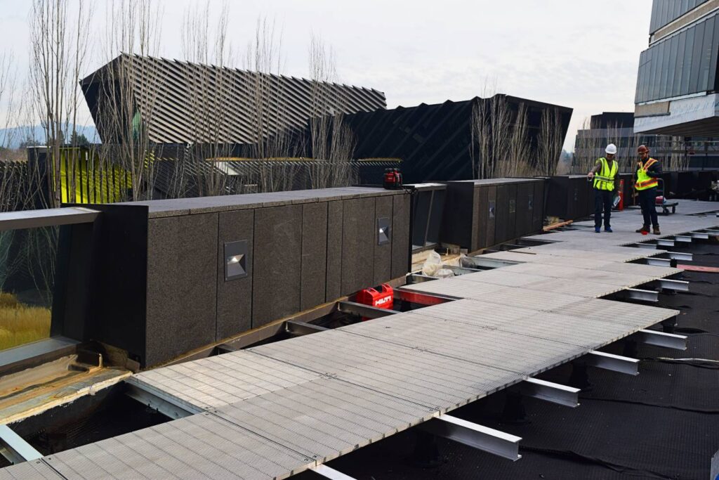 Grating Panels over Buzon Pedestals Creating Level Raised Platform for Pedestrians