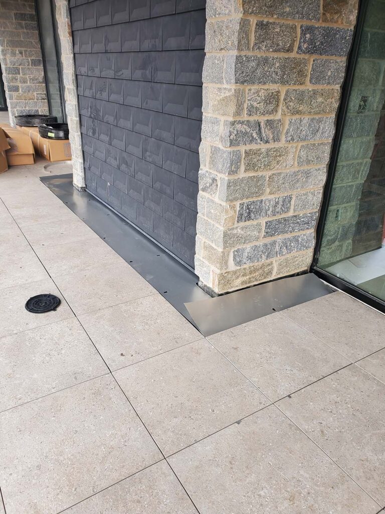 Porcelain Pavers and Buzon Pedestal Slope Corrector Shown