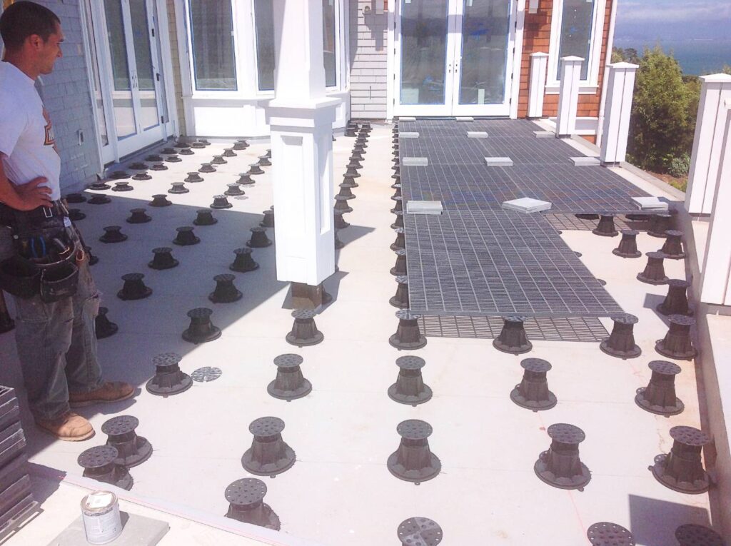 Porcelain Paver Terrace with Buzon Pedestals and HDG Grating Panels in Progress