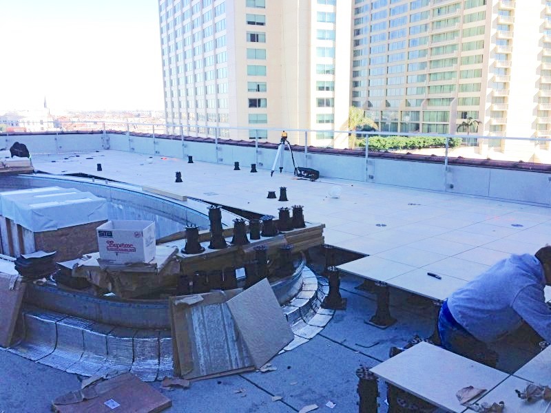 Constructing Canal Street Rooftop Pool Deck with Porcelain Pavers and Buzon Pedestals