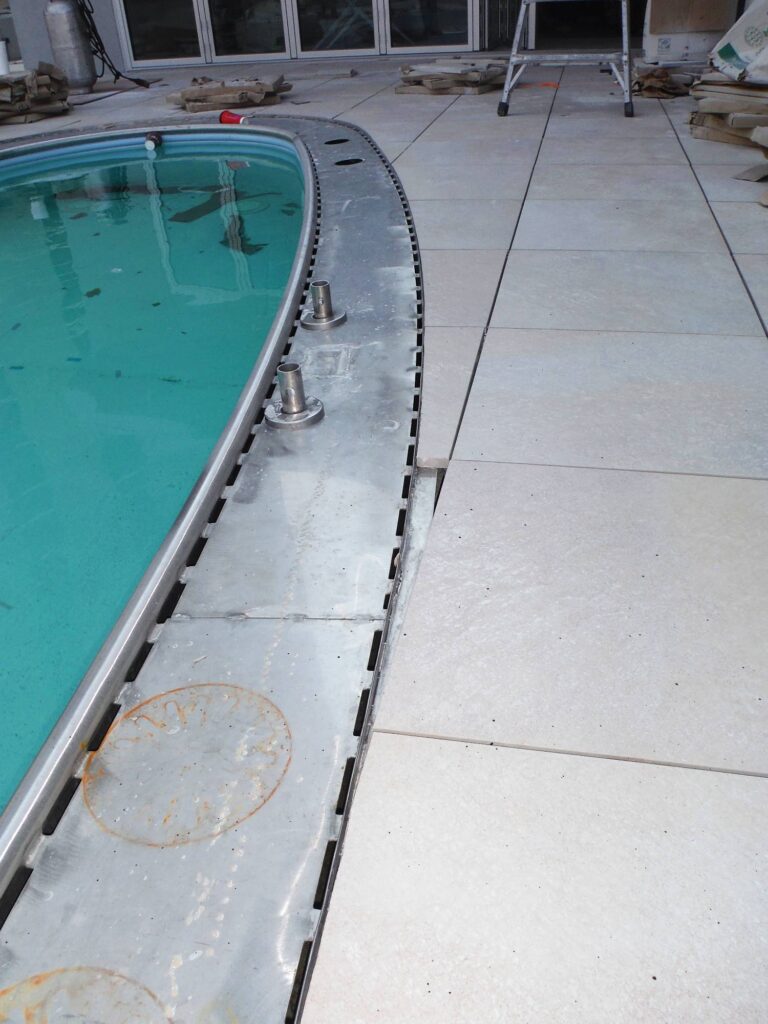 Porcelain Pavers at Edge of Pool on Rooftop Deck