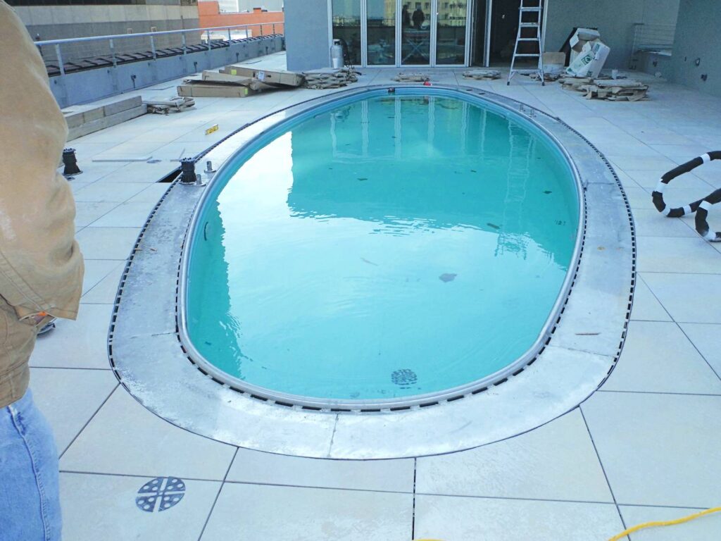 Rooftop Pool Deck Surround with Porcelain Pavers Over Buzon Pedestals