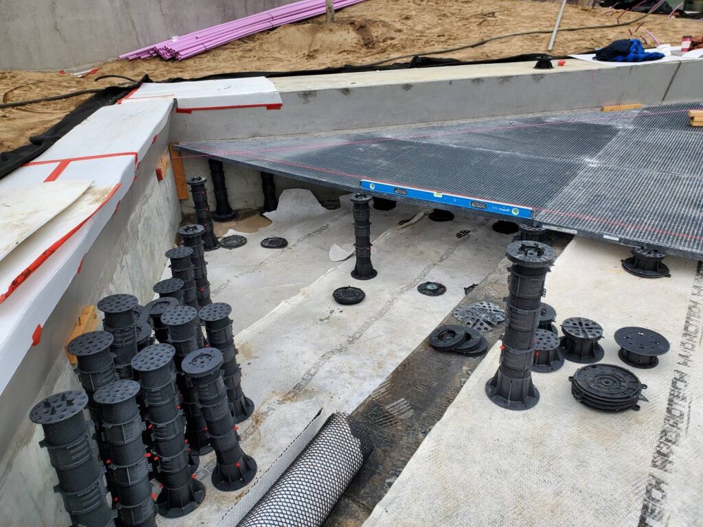 Buzon Pedestals Used with Grating Panels to Level Out Large Change in Substrate