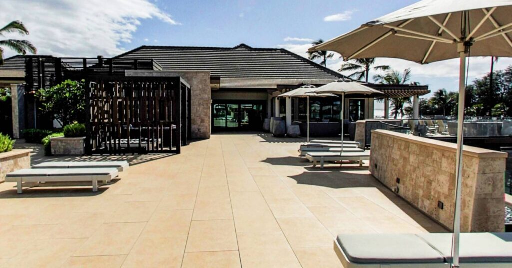 Close Up View of Porcelain Pavers Over Buzon Pedestals Near Club House