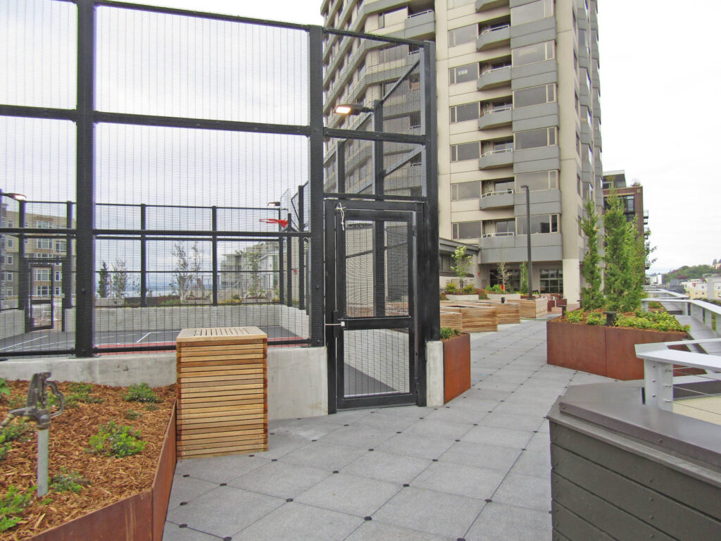 Sports Court on Rooftop Deck with Porcelain Pavers and Wind Uplift Protection
