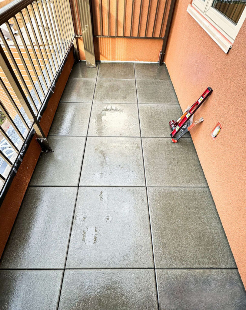 Concrete Pavers over Buzon Pedestals atop Waterproof Membrane on Balcony