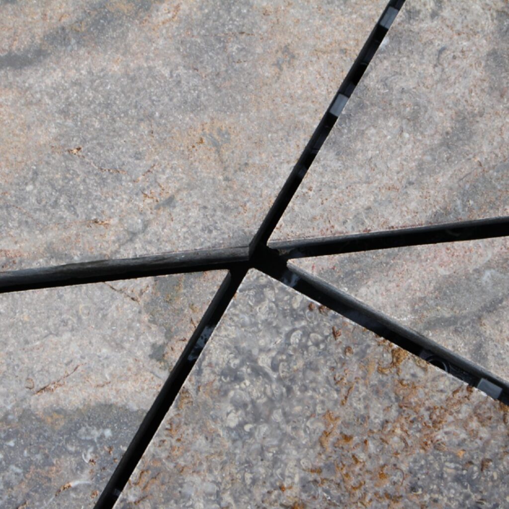 Spacer Tabs Keep Perfectly Spaced Joints on Private Terrace Made with Stone and Buzon Pedestals i