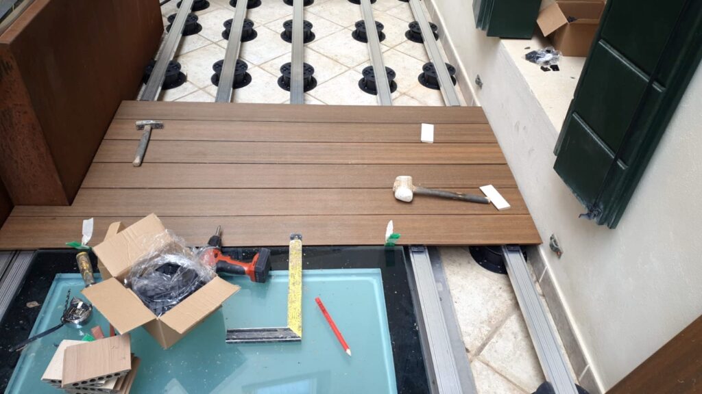 Composite Decking Over Buzon U-BRS Aluminum Joist and PB-Series Pedestals Over Dated Substrate