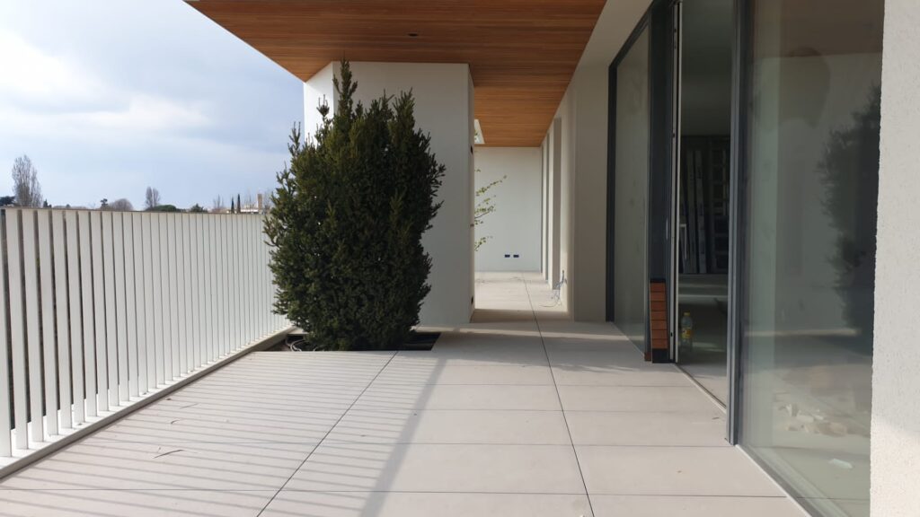 Commercial Balcony Made with Buzon Pedestal Adjustable Deck Supports and Porcelain Pavers