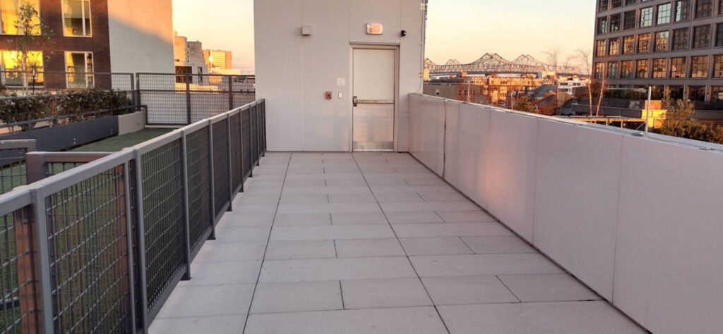 Porcelain Pavers Over Buzon Pedestals on Commercial Rooftop Deck