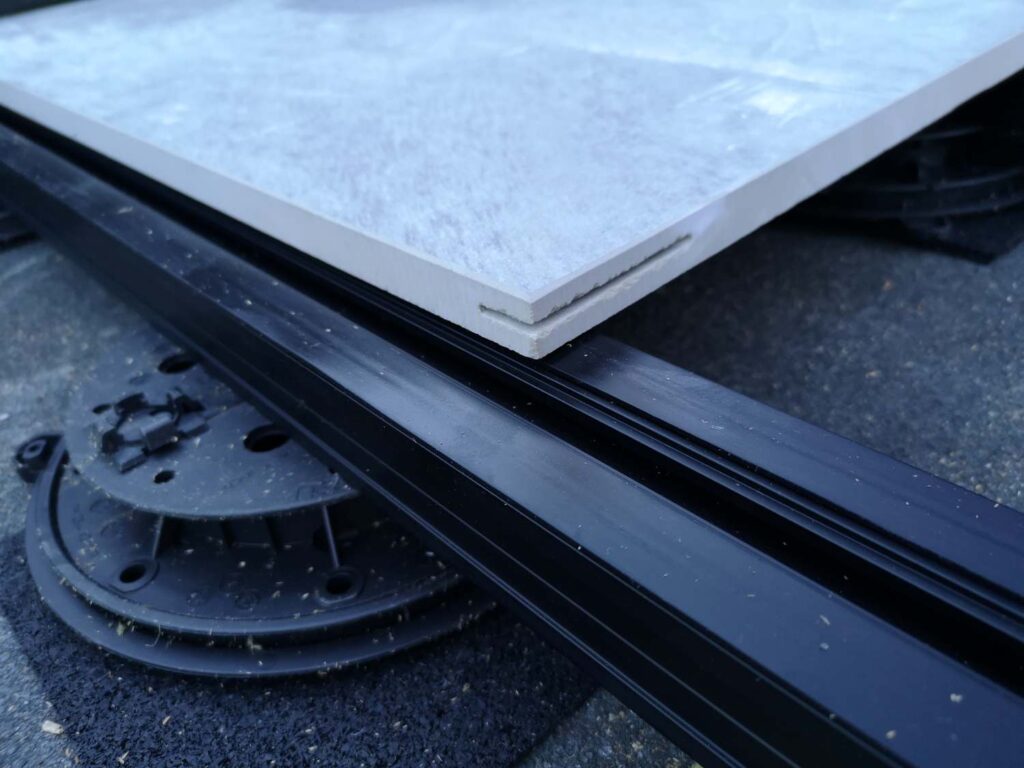 Kerf Cut Paver on E-BRS Rail on PB-Series Pedestal Over U-PAD Rubber Pad