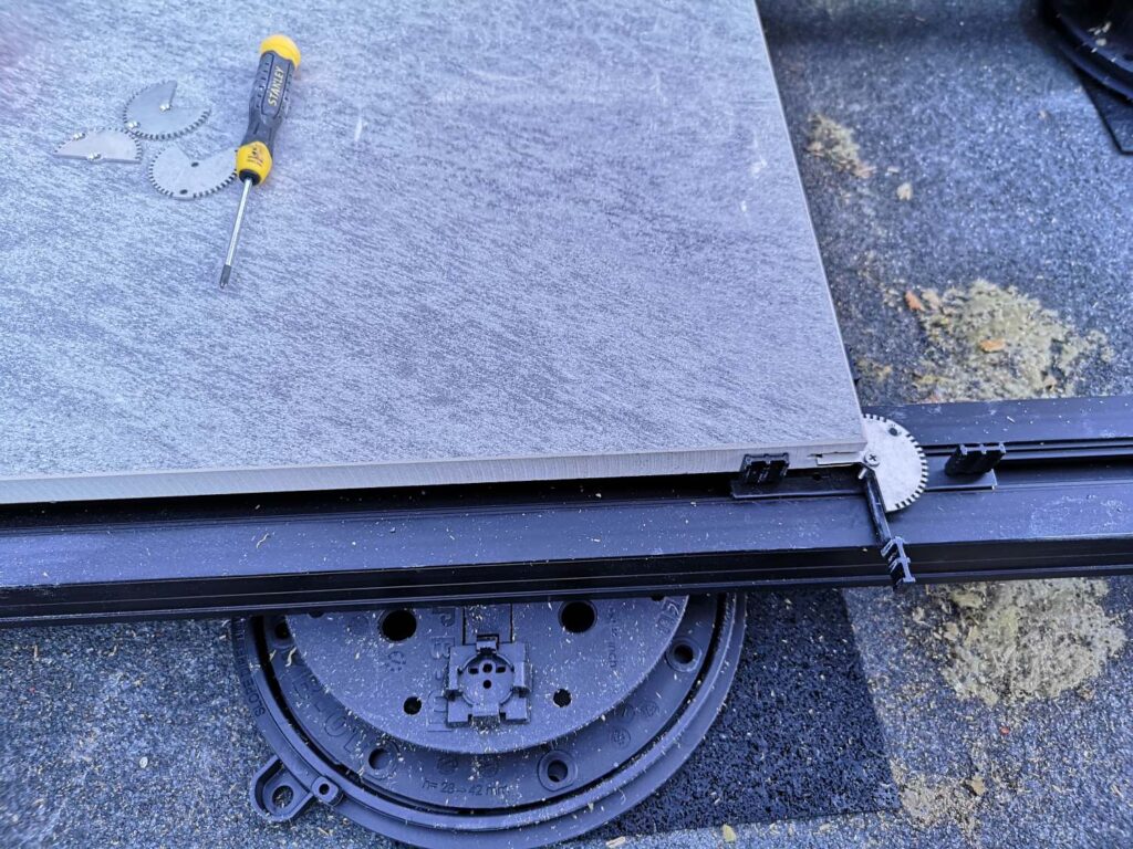 Wind Uplift Solution for Pedestal Pavers with U-Lock Washer and Spacer Tabs