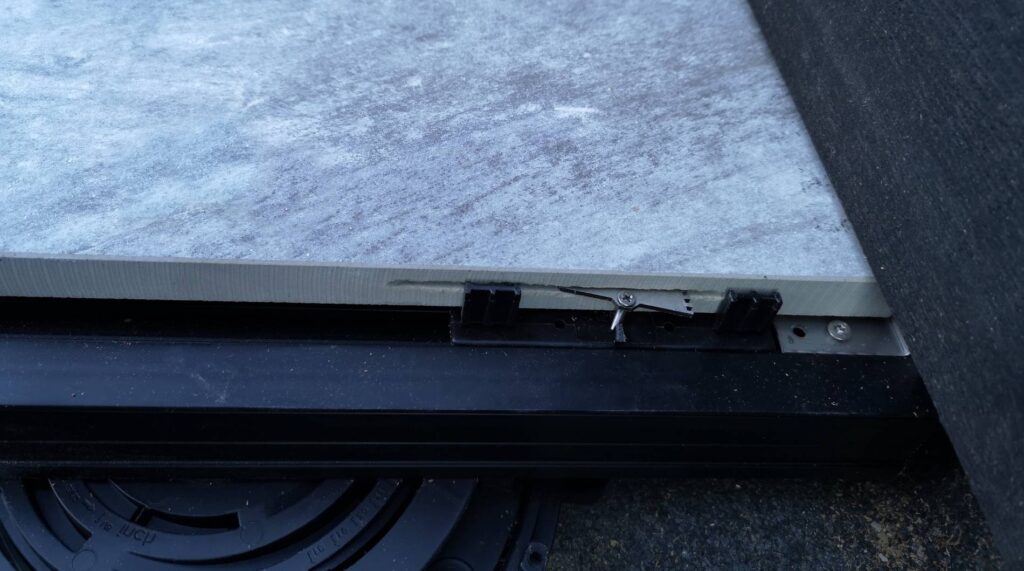 Buzon E-BRS Easy Rail Aluminum Joist with Wind Uplift System and Porcelain Pavers.