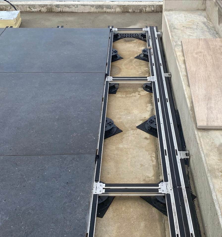 Spot the Project Features in the E-BRS Pedestal Paver Installation