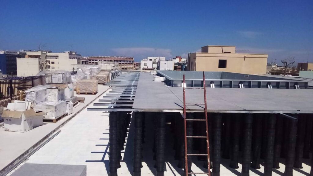 Tall Pedestal System for Rooftop Pool Deck Under Construction