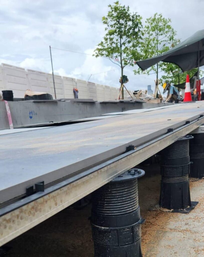 Porcelain Pavers on E-BRS Aluminum Joists Over Buzon PB-Series Pedestals with E-BRS Tabs shown